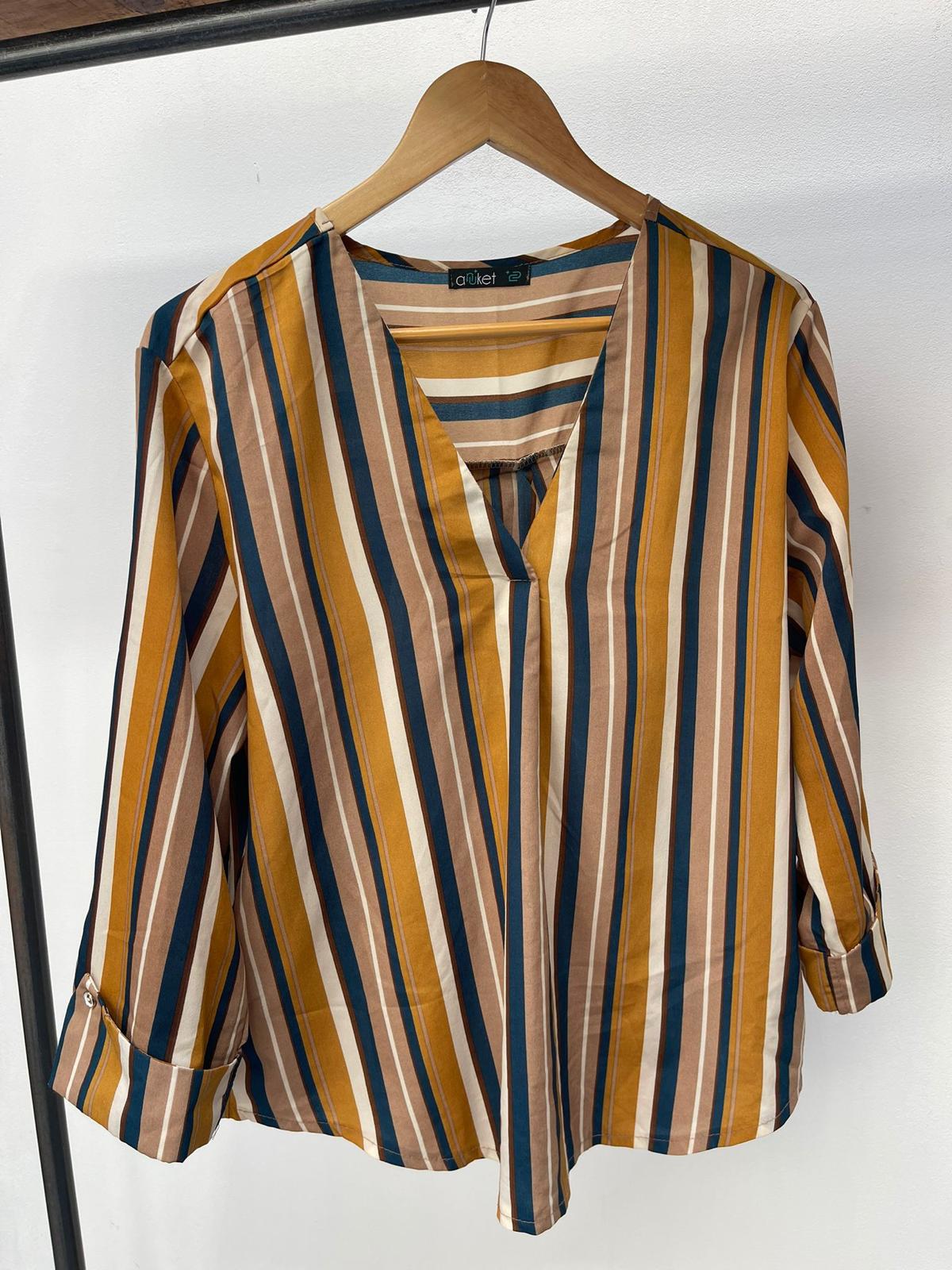BLUSA RAYAS VIBRANTE - ⚠️Liquidación Final  ❌No tiene cambio ni devolución.